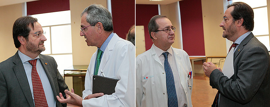 A la izquierda, Fernando Prados saluda a José Vivancos, jefe de Servicio de Neumología del Hospital Universitario La Princesa. A la derecha, Fidel Illana conversa con Fernando Prados.