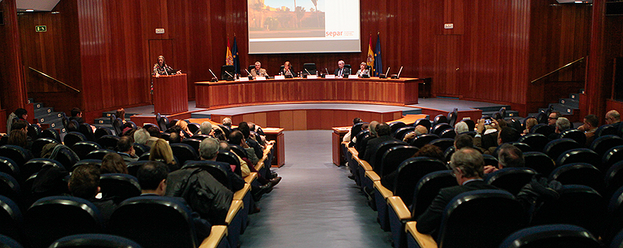 Aspecto de la sala Ernest Lluch del Ministerio de Sanidad, durante un momento del acto.